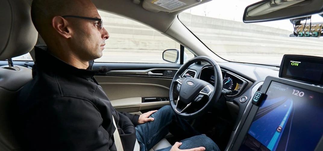 A self-driving vehicle from Mobileye's autonomous test fleet navigates the streets of Detroit.