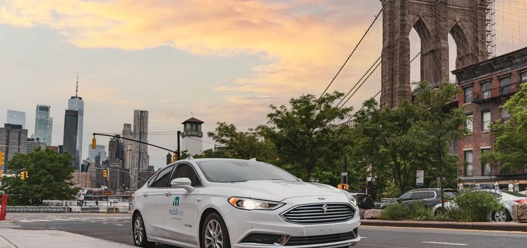 A self-driving vehicle from Mobileye’s autonomous test fleet navigates passed the Manhattan Bridge in June 2021.