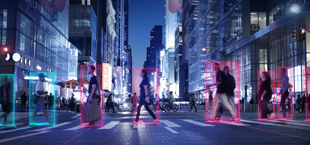 Mobileye computer vision technology detects pedestrians in a crosswalk at night.