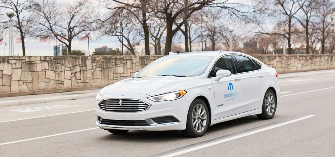 A self-driving vehicle from Mobileye's autonomous test fleet navigates the streets of Detroit.