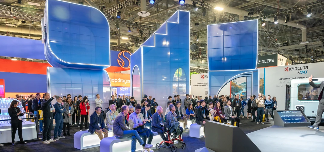 Attendees watching live main stage presentation in Mobileye's booth during CES 2025