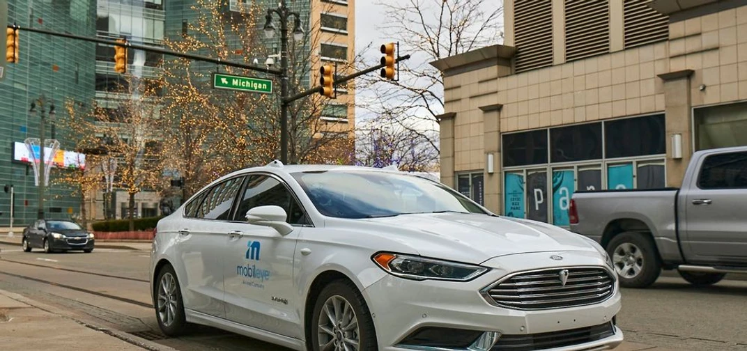 A self-driving vehicle from Mobileye's autonomous test fleet navigates the streets of Detroit.