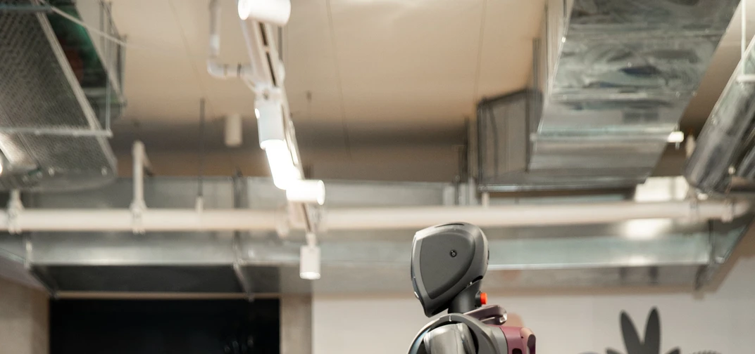 MenteeBot performs steady locomotion, stable manipulation and dexterity, and consistent decision making while interacting with real objects in a warehouse environment.